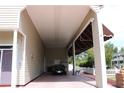 Covered carport with parking for one car at 337 Motorcoach S Dr, Polk City, FL 33868