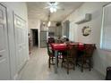 Kitchen dining area with table and chairs at 336 Motorcoach S Dr, Polk City, FL 33868