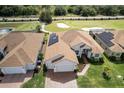 Aerial view of house with solar panels at 6265 Pinehurst Loop, Winter Haven, FL 33884