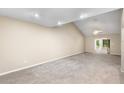 Spacious living room with high ceilings and carpet at 2025 Sylvester Rd # C4, Lakeland, FL 33803