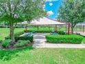 Covered picnic area with tables and benches at 800 Woodlark Dr, Haines City, FL 33844