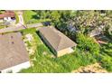 Aerial view of a newly built home with neighboring houses at 1033 Lakewood Ct, Lakeland, FL 33801