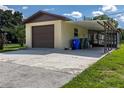 Single car garage with covered patio area at 2508 Providence Rd, Lakeland, FL 33805
