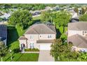 Two-story house with a pool and large backyard at 141 Minniehaha Cir, Haines City, FL 33844