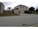 Two-story house with attached garage at 600 Sunway Ln, Winter Haven, FL 33880