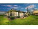 Single story home with backyard and patio at 7884 N Lake Buffum Shores Rd, Fort Meade, FL 33841