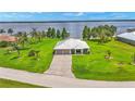 Single-story home on waterfront lot with large yard at 7884 N Lake Buffum Shores Rd, Fort Meade, FL 33841