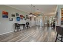 Spacious living room with hardwood floors and high ceilings at 6803 Hermitage Dr, Lakeland, FL 33810