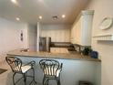 Well-equipped kitchen with stainless steel appliances at 323 Travelers Dr, Polk City, FL 33868