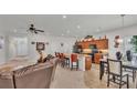 Open kitchen with an island and wooden cabinets at 1955 Danes Ct, Lakeland, FL 33810