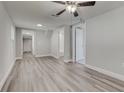 Spacious living area with hardwood floors and ceiling fan at 2529 Weber St, Lakeland, FL 33801