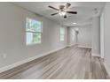 Bright living room with hardwood floors and neutral walls at 2529 Weber St, Lakeland, FL 33801