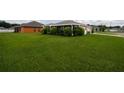 Single-story home with screened patio at 1619 Prairie Blossom Dr, Lakeland, FL 33810