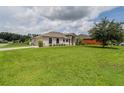 Single-story home with spacious yard at 1619 Prairie Blossom Dr, Lakeland, FL 33810