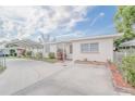 House exterior with carport and landscaping at 121 Coleman Rd, Winter Haven, FL 33880