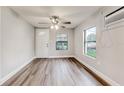Spacious living room featuring hardwood floors and a view of the front yard at 2429 Lakeview St, Lakeland, FL 33801