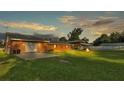 Backyard with firepit and large yard at 4390 Sunnyside Dr, Lakeland, FL 33810