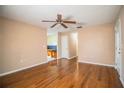 Bright living room with hardwood floors and ceiling fan at 3933 Strickland Ct, Lakeland, FL 33812
