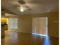 Bright living room with tile floors and sliding glass doors at 5009 Cimarron Dr, Lakeland, FL 33813