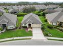 One-story house in a residential neighborhood with a large yard at 2356 Lake James Way, Lakeland, FL 33810