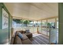 Relaxing screened porch with sectional sofa and view at 2430 Old Homeland Rd, Bartow, FL 33830