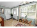 Bright and airy front entry with tiled floor and ample natural light at 308 Allamanda Dr, Lakeland, FL 33803