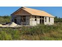 Single-story home under construction, showing framing at 7391 Orlando Dr, Lake Wales, FL 33855