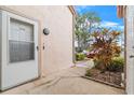 Condo entryway with door and screen at 1710 Garden Lake Dr # 1710, Winter Haven, FL 33884
