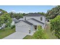 Two-story house with gray siding and stone accents at 258 Padgett Pl S, Lakeland, FL 33809