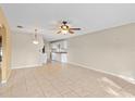Open dining area with tile floors and kitchen access at 618 Ridge Ter, Winter Haven, FL 33881