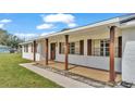 Front porch detail of charming ranch house at 2917 Wiregrass Rd, Lakeland, FL 33810