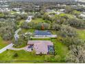 Aerial view of property showing house and surrounding land at 225 Canterwood Ln, Mulberry, FL 33860