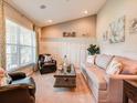 Living Room with contemporary furniture and neutral color scheme at 1365 Melrose St, Lake Alfred, FL 33850