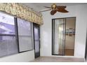 Bright sunroom with sliding glass doors and window blinds at 6064 Condor Dr, Lakeland, FL 33809