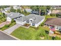 Aerial view of a house and neighborhood at 5873 Macaw Pl, Lakeland, FL 33809