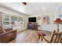 Spacious living room with hardwood floors and fireplace at 1610 Reynolds Rd # 79, Lakeland, FL 33801
