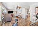 Open living room with home gym and view into kitchen at 1610 Reynolds Rd # 79, Lakeland, FL 33801