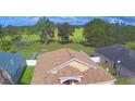 Aerial view of the home's roof, backyard, and neighboring properties at 3226 Oak Tree Ln, Winter Haven, FL 33884