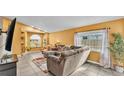 Bright and spacious living area with large windows and ample natural light at 4617 S Devon Ave, Lakeland, FL 33813