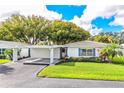 Attractive single-story home with covered carport and manicured landscaping at 540 Kelsey St, Lakeland, FL 33803