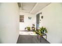 Welcoming front entryway with potted plants and decorative accents at 540 Kelsey St, Lakeland, FL 33803