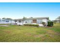 House exterior showcasing a large yard at 1568 S Lake Shipp Dr, Winter Haven, FL 33880