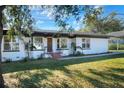 Updated home exterior with a modern look and landscaping at 425 E Belmar St, Lakeland, FL 33803