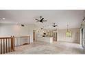 Open living area with vaulted ceilings and tile floors at 6468 Engram Rd, New Smyrna Beach, FL 32169