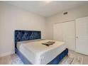 Spacious bedroom with plush bed and ample closet space at 6468 Engram Rd, New Smyrna Beach, FL 32169