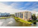 Aerial view of condo building by the lake at 5300 S Atlantic Ave # 8502, New Smyrna Beach, FL 32169