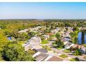 Aerial view showing home's location in a quiet residential neighborhood at 806 Pine Shores Cir, New Smyrna Beach, FL 32168