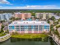 Aerial view of building and surrounding area at 1 Riverwalk Dr # 206, New Smyrna Beach, FL 32169