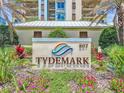 Tidemark community sign with building in background at 807 S Atlantic Ave # 302, New Smyrna Beach, FL 32169