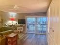 Living room with ocean view and comfortable seating at 3700 S Atlantic Ave # 402, New Smyrna Beach, FL 32169